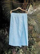 Noa Skirt- Sky Blue Linen Skirt | Jhultaru. 100% Linen- sustainable, eco-friendly, lightweight, breathable, and biodegradable- A sky blue skirt in pure linen, the Noa Skirt by Jhultaru features soft pleats and a clean silhouette for effortless, everyday grace.