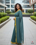 Woman wearing Neerja handloom cotton saree perfect for a professional office look