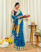 Women wearing lightweight blue mulmul cotton saree designed for long festive gatherings