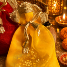 Rangoli Pink & Festive Potli Gift Basket | Shubh Labh & Almonds Diwali Hamper - https://artecasa.in/