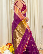 Women wearing lightweight purple mulmul cotton saree designed for comfort during celebrations and gatherings