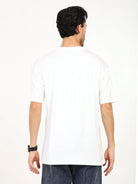 Back view of a man wearing an oversized bamboo T-shirt, showcasing its loose fit and soft fabric.