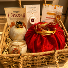Utsav Jute Net Festive Gift Basket | Red Potli, Pomegranate & Soy Wax Candle - https://artecasa.in/