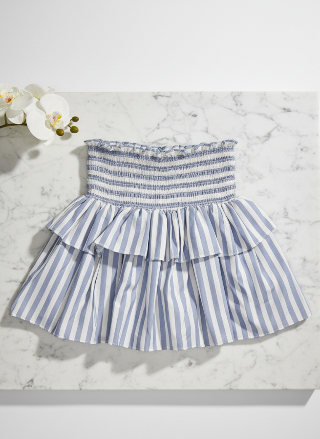 Amalfi Skort side view showing hand-smocked elastic waistband