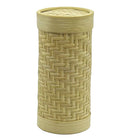 Woven cylindrical basket with a lid on a white background