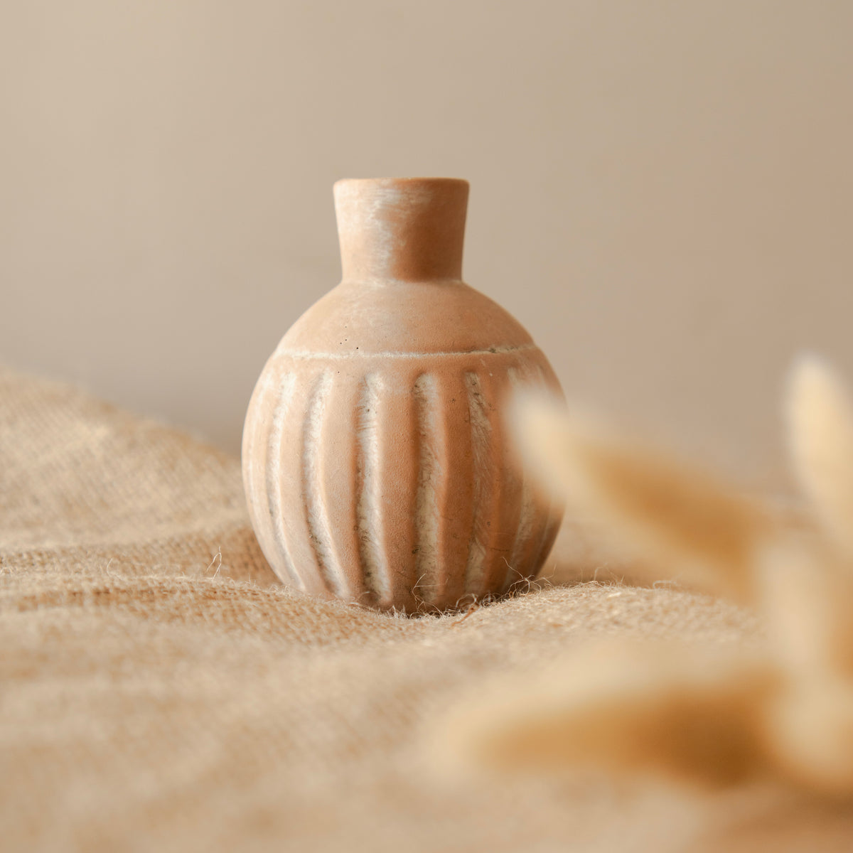 Rustic vase with bunny tails - https://artecasa.in/
