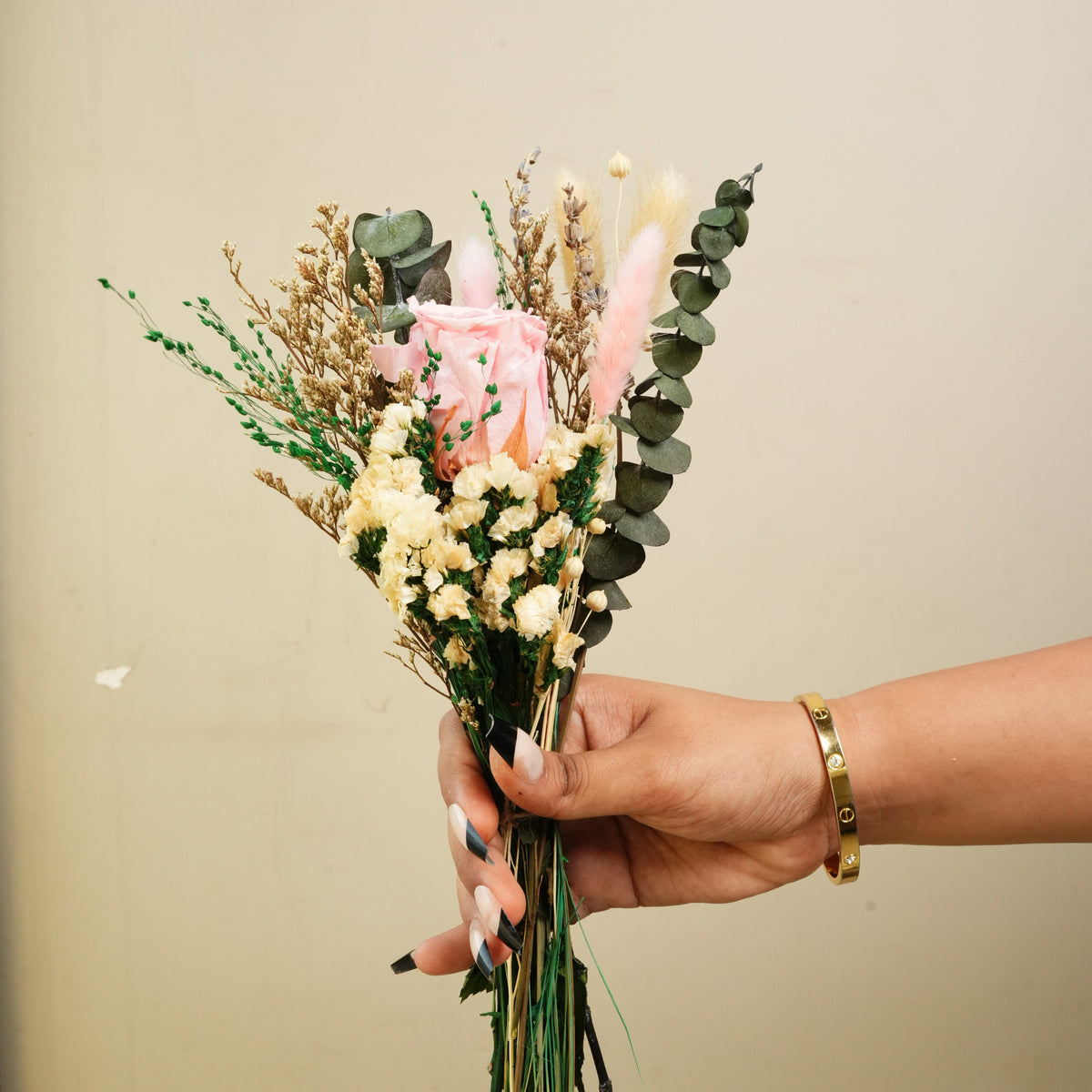 Elegant pink floral bouquet with dried flowers