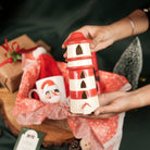 Santa Merry Magic Set – Christmas Gift Hamper with Penguin Mug, Santa Cap, Candles & Tealight House | Premium Festive Gift Box India - https://artecasa.in/