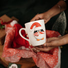 Santa Merry Magic Set – Christmas Gift Hamper with Penguin Mug, Santa Cap, Candles & Tealight House | Premium Festive Gift Box India - https://artecasa.in/