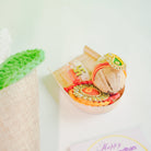 Handcrafted crochet lily Rakhi hamper (White) - https://artecasa.in/