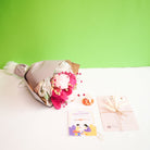 Pretty Pansy Bouquet Rakhi hamper - https://artecasa.in/