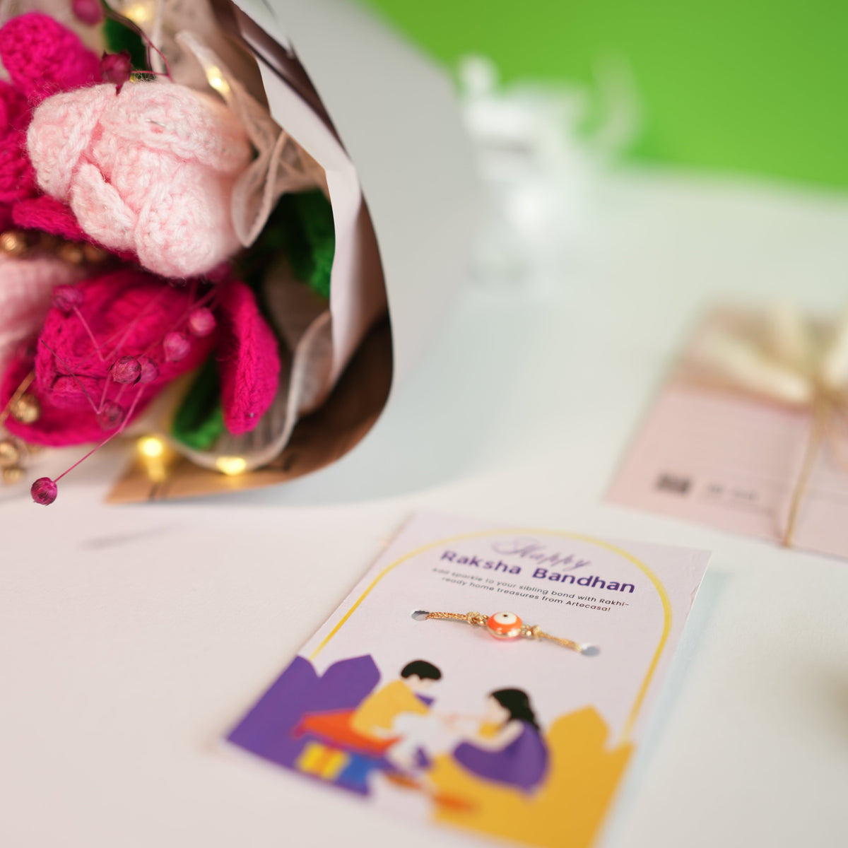Pretty Pansy Bouquet Rakhi hamper - https://artecasa.in/