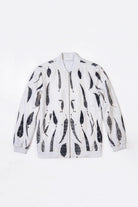 A white zip-up hemp bomber jacket featuring a black eco-print, displayed flat against a plain white background.