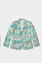 A women's long-sleeve linen blazer with a colorful abstract geometric print in shades of blue, green, orange, and beige on a white base, shown against a plain light gray background.