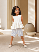 Vienna Blouse and Nice Shorts set front view, white pleated organic cotton blouse with striped shorts