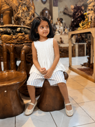 Vienna Blouse and Nice Shorts set styled on child showing coordinated summer outfit