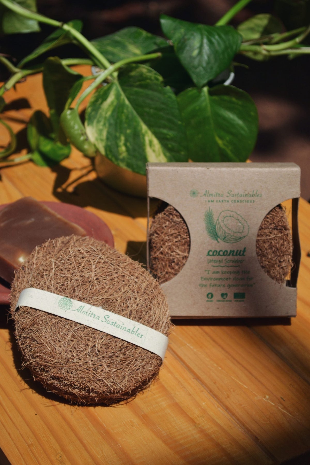 Flat, round coir scrub pad made from coconut fibre, perfect for zero waste dishwashing and cleaning.