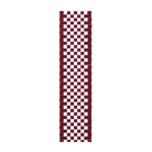 Checkered table runner in red with a table set up 
