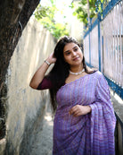 Rimjhim violet embroidered mulmul cotton saree with embroidery, a lightweight breathable saree for summer and festive wear.