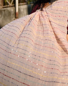 Ivory Sky cotton saree, handcrafted with fine embroidery for a breathable and graceful look.