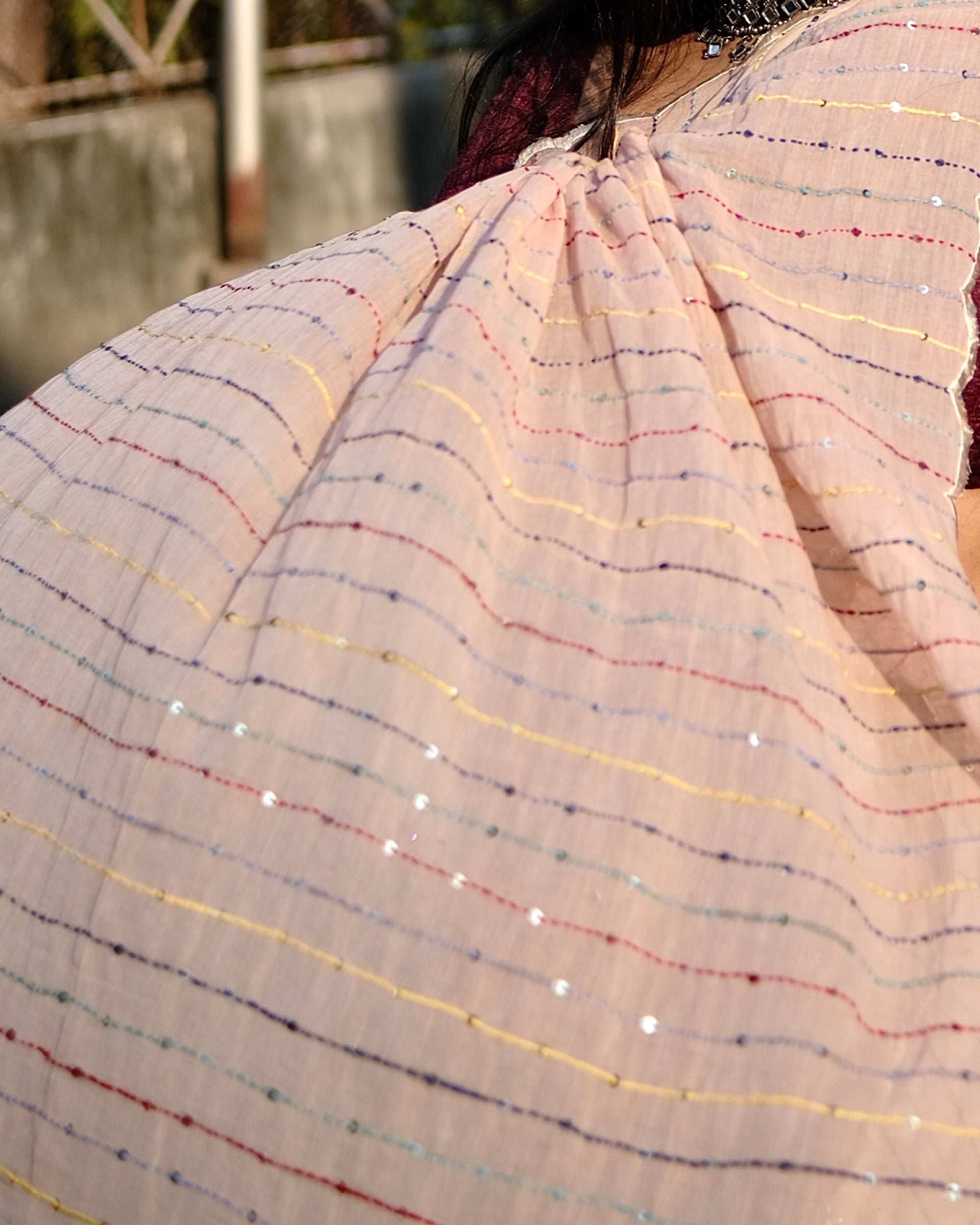 Ivory Sky cotton saree, handcrafted with fine embroidery for a breathable and graceful look.