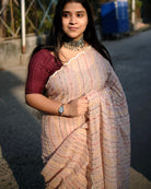 Ivory Sky ivory embroidered mulmul cotton saree, a lightweight breathable saree for summer and festive wear.