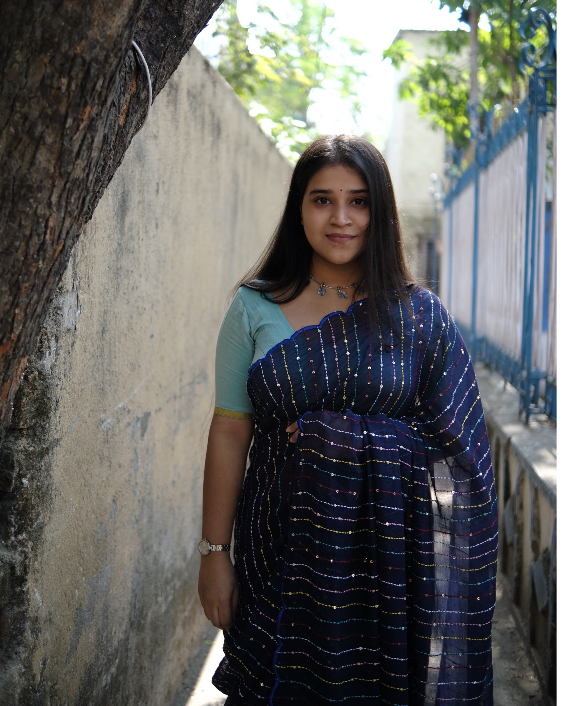 Soft and comfortable mulmul cotton saree with multicoloured embroidery in Kantha Stitch embellished with sequins perfect for party or festive occasion  in navy blue