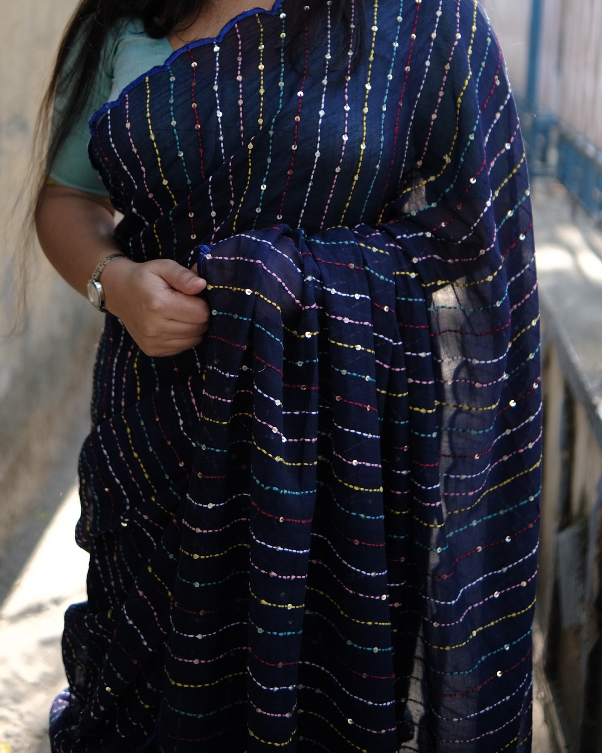 Soft and comfortable mulmul cotton saree with multicoloured embroidery in Kantha Stitch embellished with sequins perfect for party or festive occasion  in navy blue