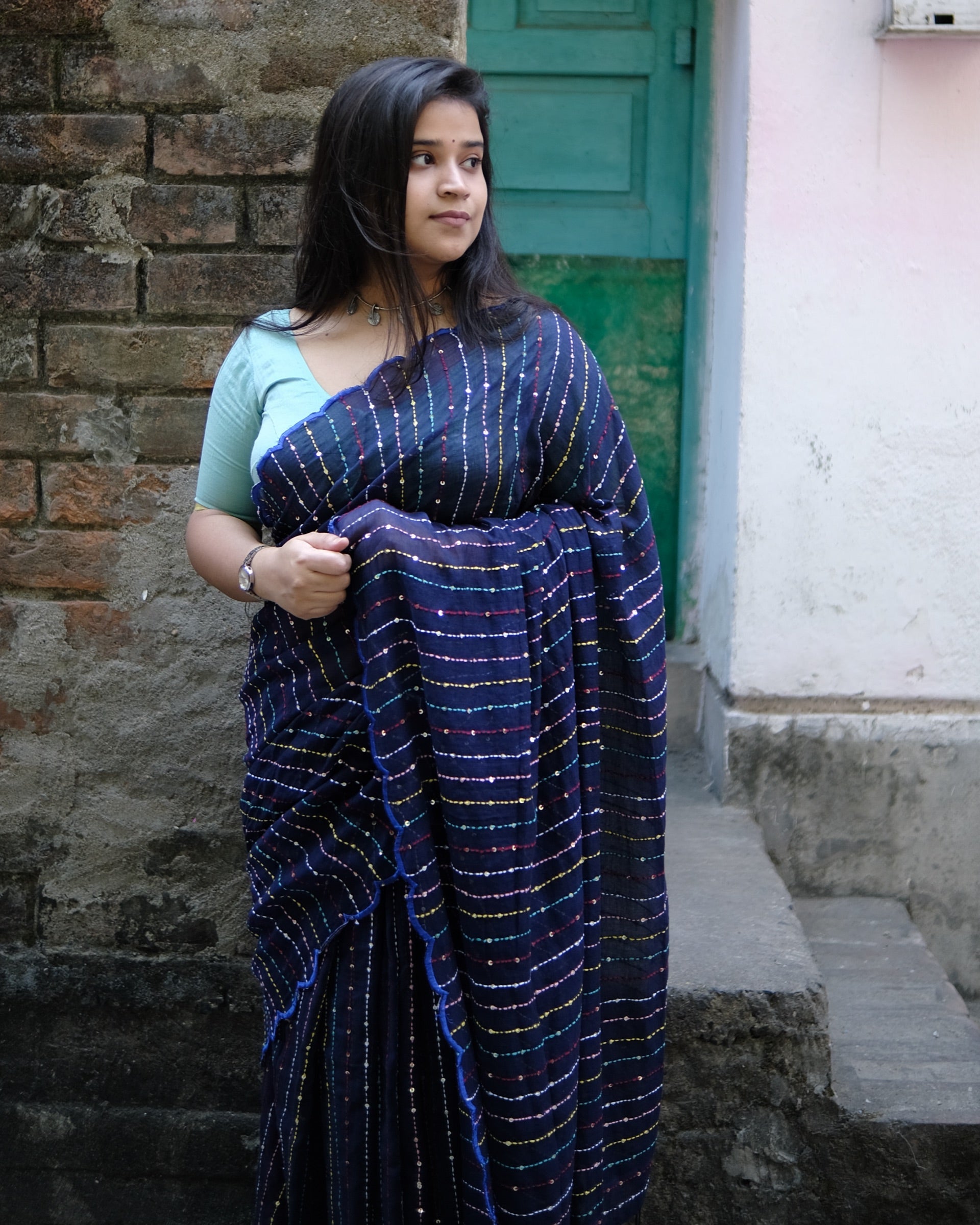 Soft and comfortable mulmul cotton saree with multicoloured embroidery in Kantha Stitch embellished with sequins perfect for party or festive occasion  in navy blue