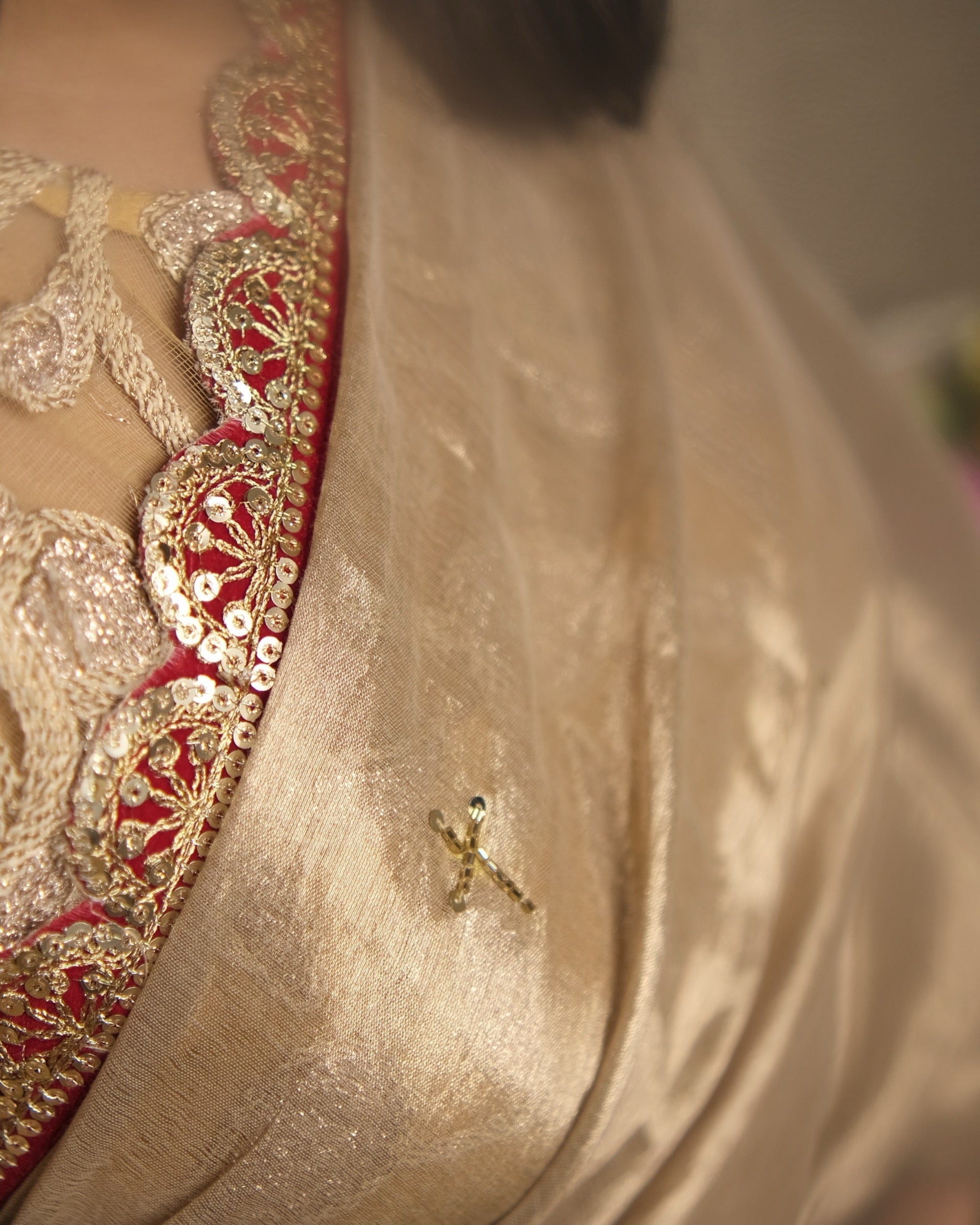 Mulmul Tissue Festive/Party Wear saree for the wedding season in  gold colour  with red Sari border and Zardozi/Jarsousi  work on entire saree, metallic finish