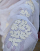Soft and Comfortable mulmul cotton saree with Chikankari machine work and cutwork border in self tones of White