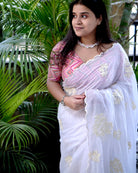 Soft and Comfortable mulmul cotton saree with Chikankari machine work and cutwork border in self tones of White