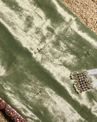 Mulmul Tissue Festive/Party Wear saree for the wedding season in green with red Sari border and Zardozi/Jarsousi  work on entire saree, metallic finish