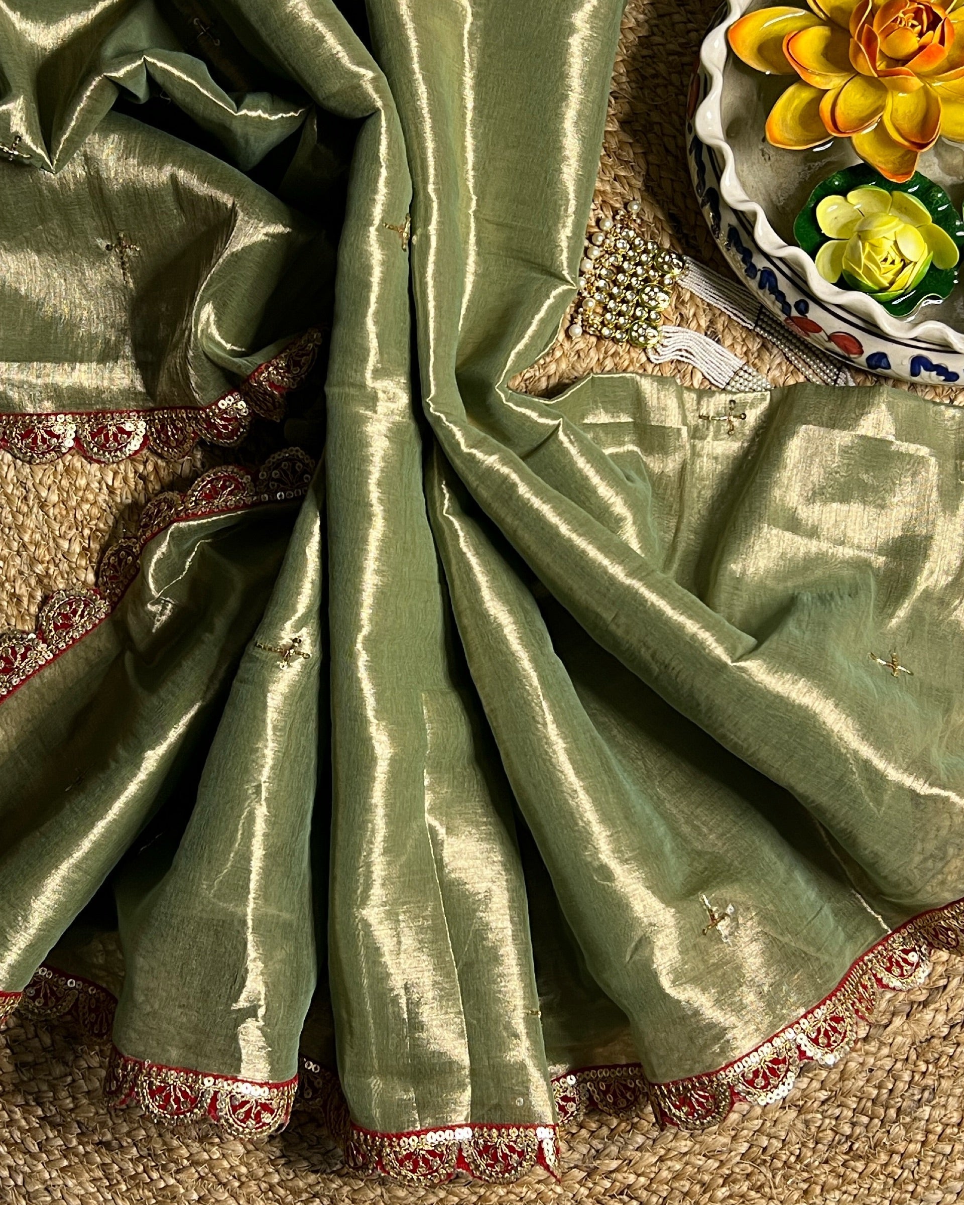 Mulmul Tissue Festive/Party Wear saree for the wedding season in green with red Sari border and Zardozi/Jarsousi  work on entire saree, metallic finish