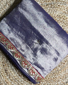 Mulmul Tissue Festive/Party Wear saree for the wedding season in  lavender / purple / violet  colour  with red Sari border and Zardozi/Jarsousi  work on entire saree, metallic finish