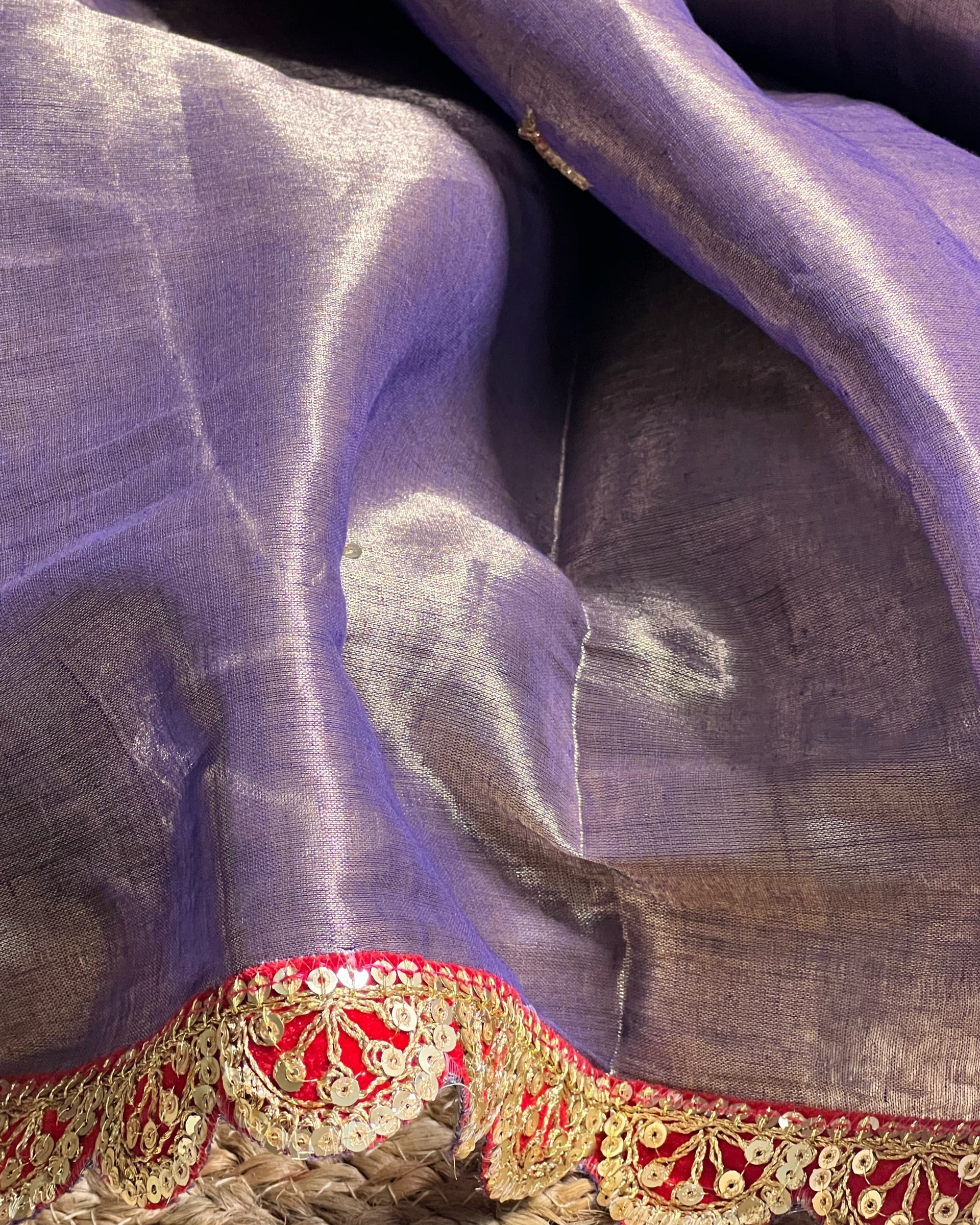 Mulmul Tissue Festive/Party Wear saree for the wedding season in  lavender / purple / violet  colour  with red Sari border and Zardozi/Jarsousi  work on entire saree, metallic finish
