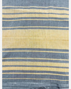Grey handloom cotton saree with golden satin border