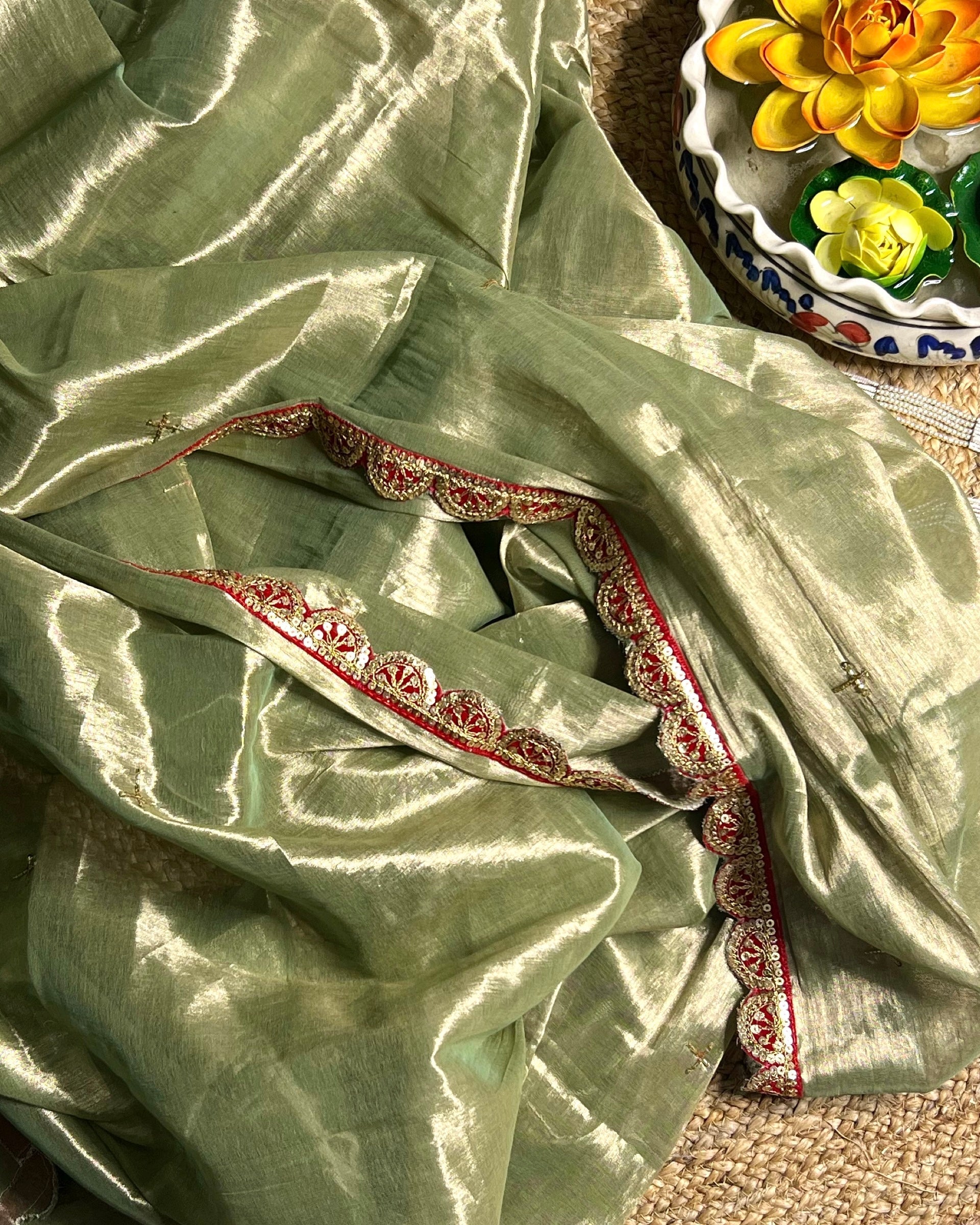 Mulmul Tissue Festive/Party Wear saree for the wedding season in green with red Sari border and Zardozi/Jarsousi  work on entire saree, metallic finish