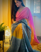 Multicoloured Mulmul Cotton Designer festive or party Saree with Zari stripes on pink yellow teal