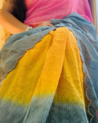 Multicoloured Mulmul Cotton Designer festive or party Saree with Zari stripes on pink yellow teal