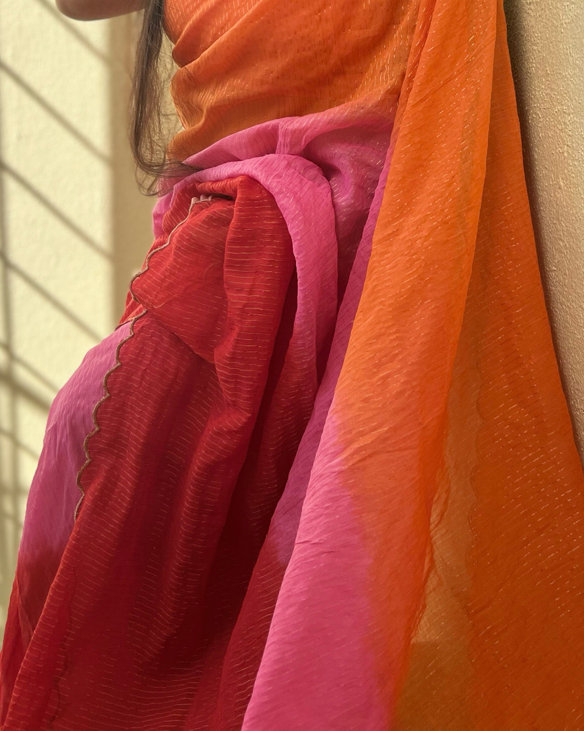 Multicoloured Mulmul Cotton Designer festive or party Saree with Zari stripes on pink orange red