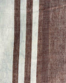 Off white soft and comfortable khadi cotton saree printed in brown itsy bitsy patterns
