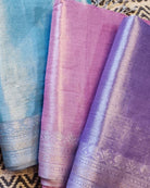 Festive sarees featuring soft mulmul tissue fabric and elegant ethnic charm