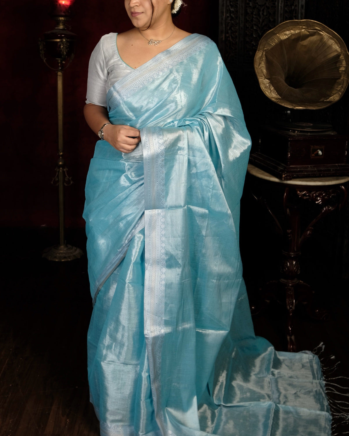 Asmaani Blue Mulmul Tissue Saree with silver border by Shop Aame