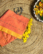 Soft and Comfortable mulmul cotton saree in peach yellow shade with sequin emblishment for festive or party wear at reasonable price
