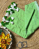 Soft and Comfortable mulmul cotton saree in green shade with sequin emblishment for festive or party wear at reasonable price