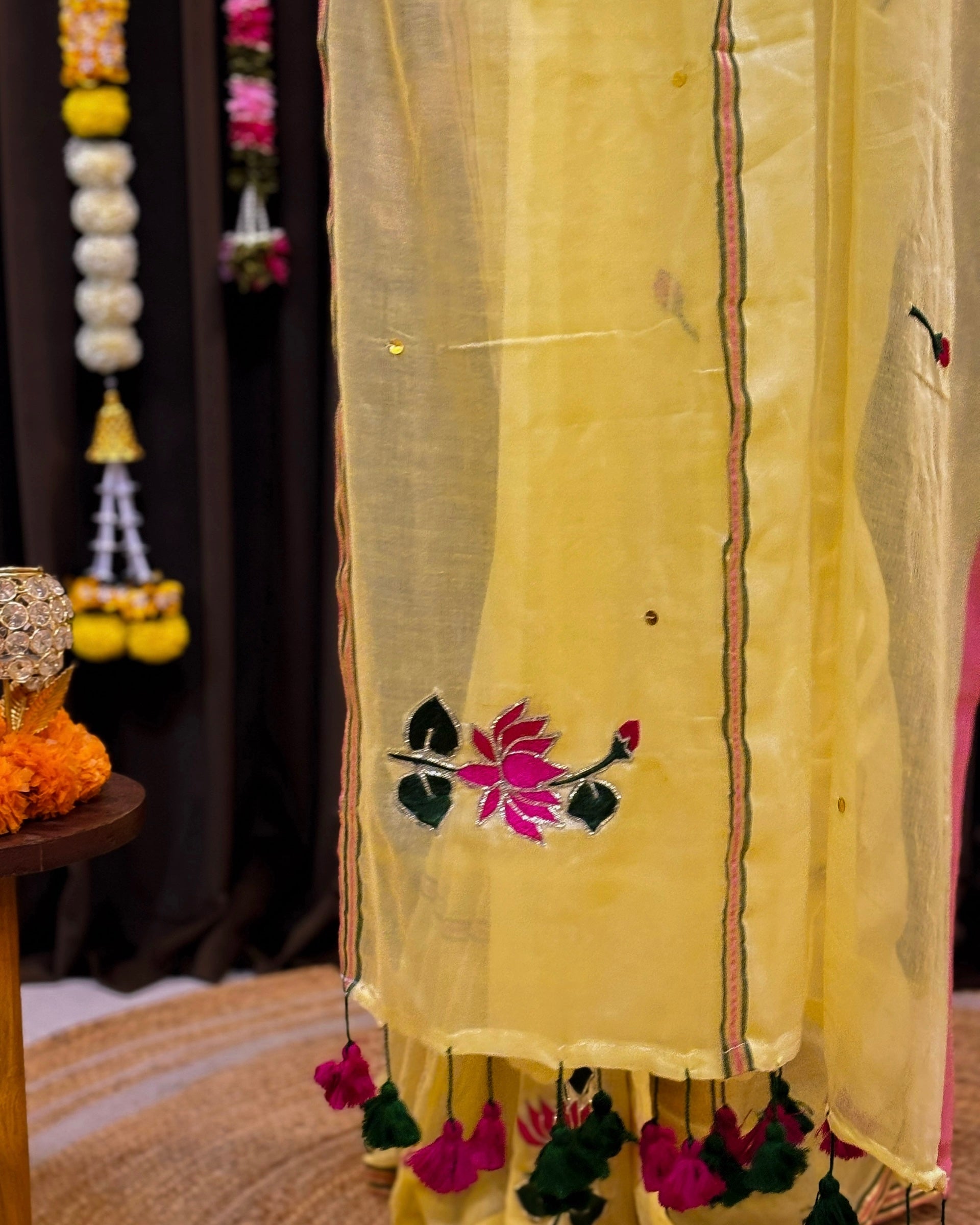 Hand embroidered yellow mulmul cotton saree with floral lotus design