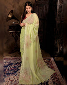 Green rose saree in soft mulmul cotton, handcrafted with sequins embroidery for elegant festive and everyday wear.