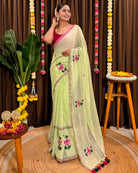 Hand embroidered green mulmul cotton saree with floral lotus design