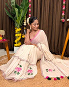 White mulmul cotton saree with hand embroidered lotus design